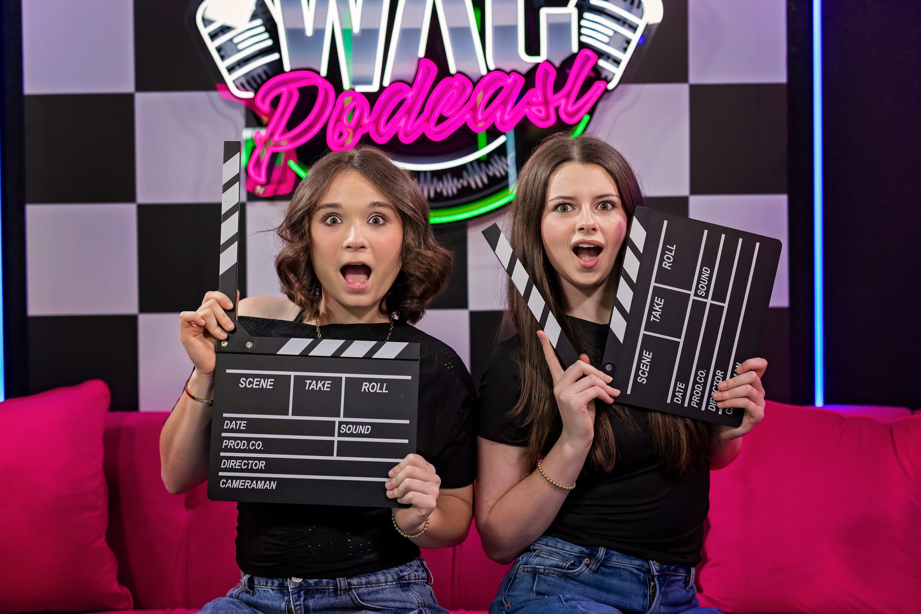 Annabella and Scarlett reacting on the WAG Podcast set